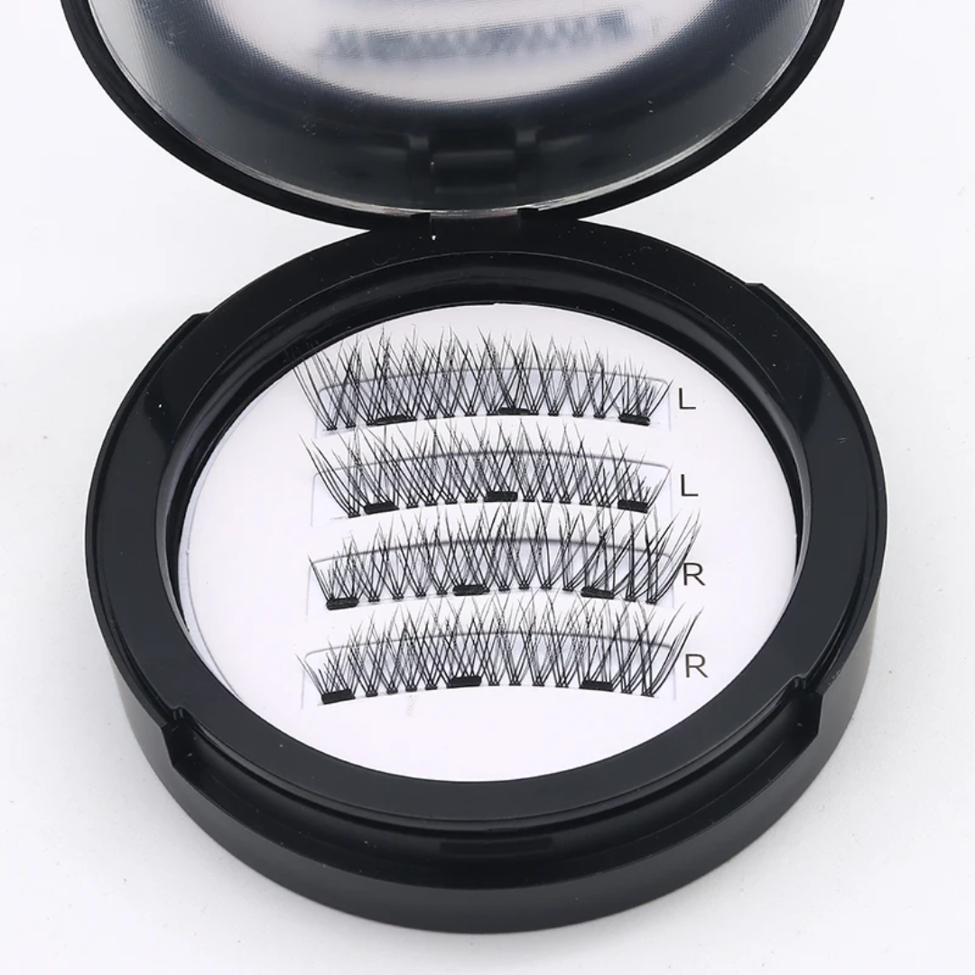 Open black circular case displaying three pairs of black false eyelashes on a white insert labeled L and R, on a white background.