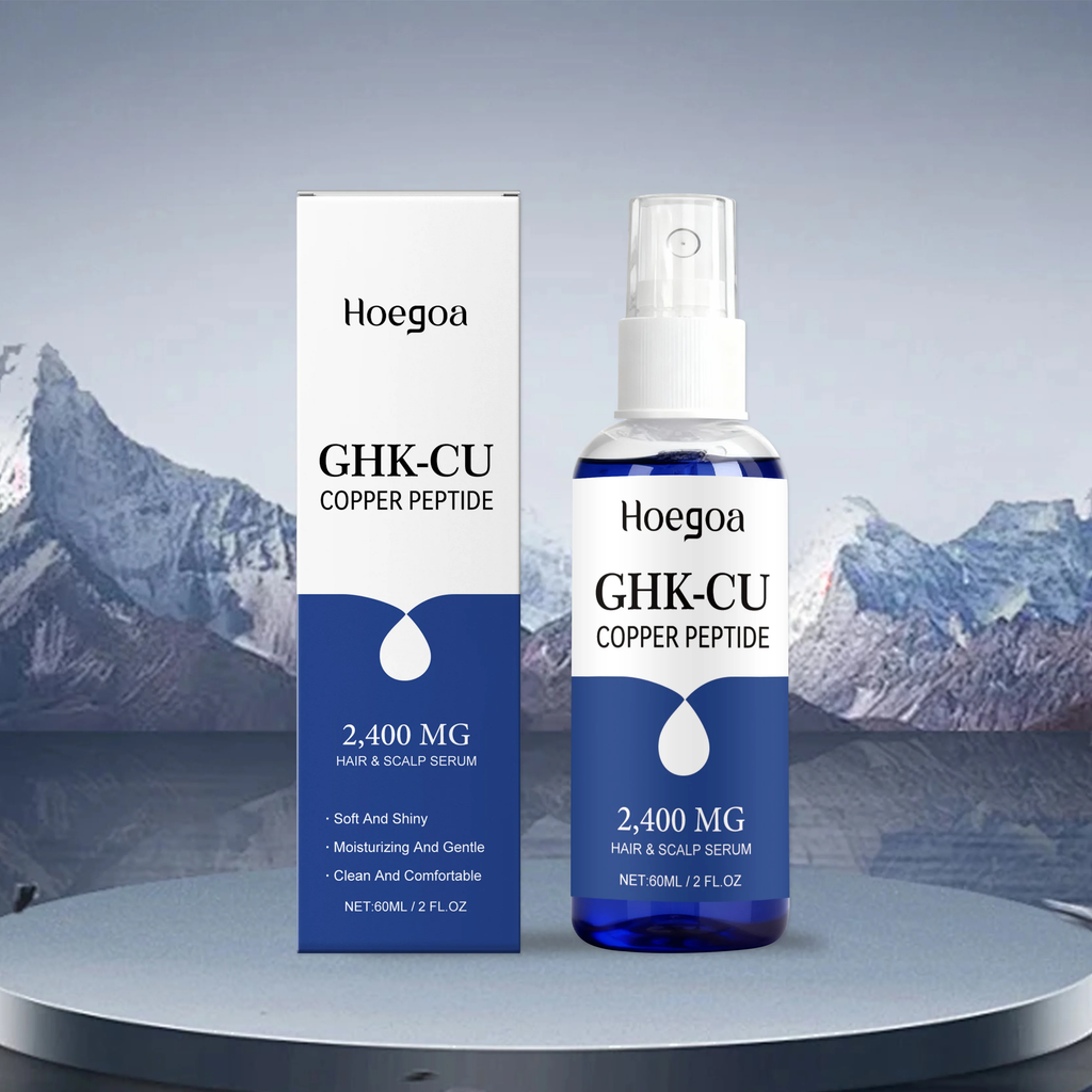 A bottle and box of Hoegoa GHK-CU Copper Peptide Hair & Scalp Serum, 2,400 mg, displayed on a round pedestal with a mountain backdrop.