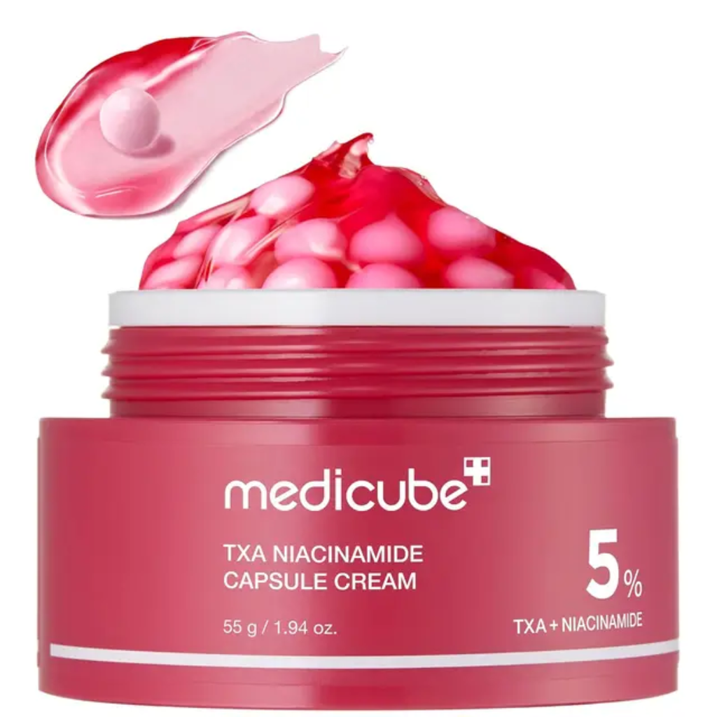 Red jar of Medicube TXA Niacinamide Capsule Cream with pink cream and capsules on a white background