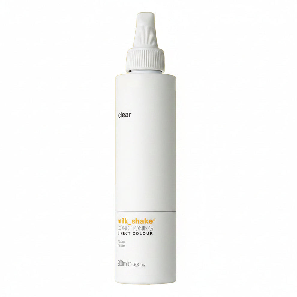 White bottle of 'milk shake' color care product on a white background